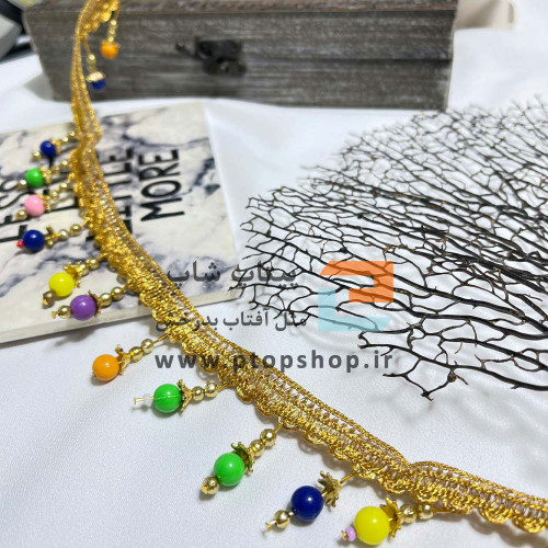 نوار خرجکار آویزی پرکار طلایی با مهره های رنگی و طلایی