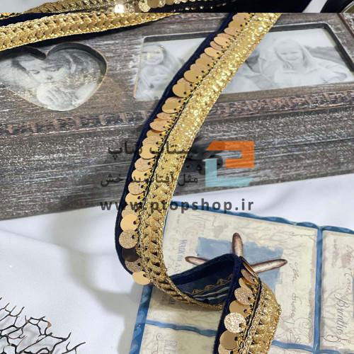 نوار خرج کار پولک دوزی طلایی روی پارچه مخمل