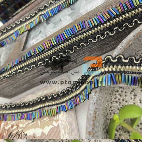 نوار خرج کار مشکی حرارتی با ملیله تیره هفت رنگ و سرمه دوزی 
