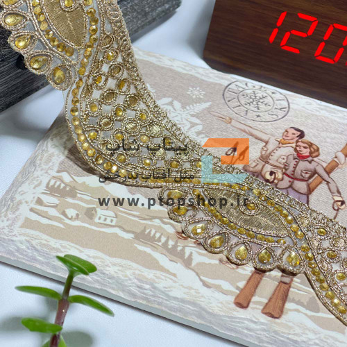 نوار خرج کار لمه کاری رنگ بژ با نگین اشکی روی توری ارگانزا