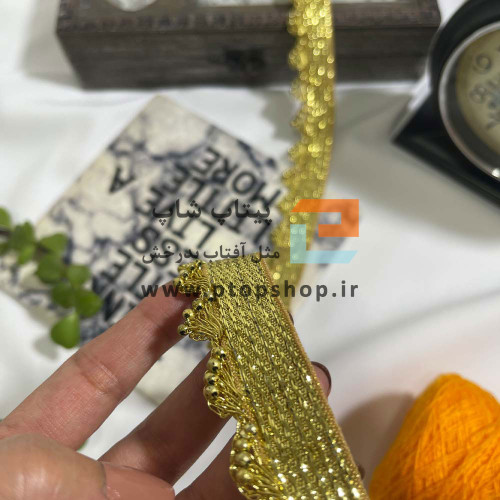 نوار خرجکار طلایی دیزاین شده با مهره طلایی و نخ زری دوزی
