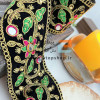 نوار خرج کار لمه و گلدوزی با آینه و نگین کاری روی زمینه مخمل مشکی