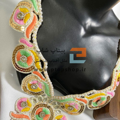 خرجکار لباس مشکی گلدوزی همراه با مروارید، نگین و پولک کاری